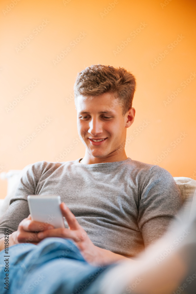 Young Man Using A Smartphone