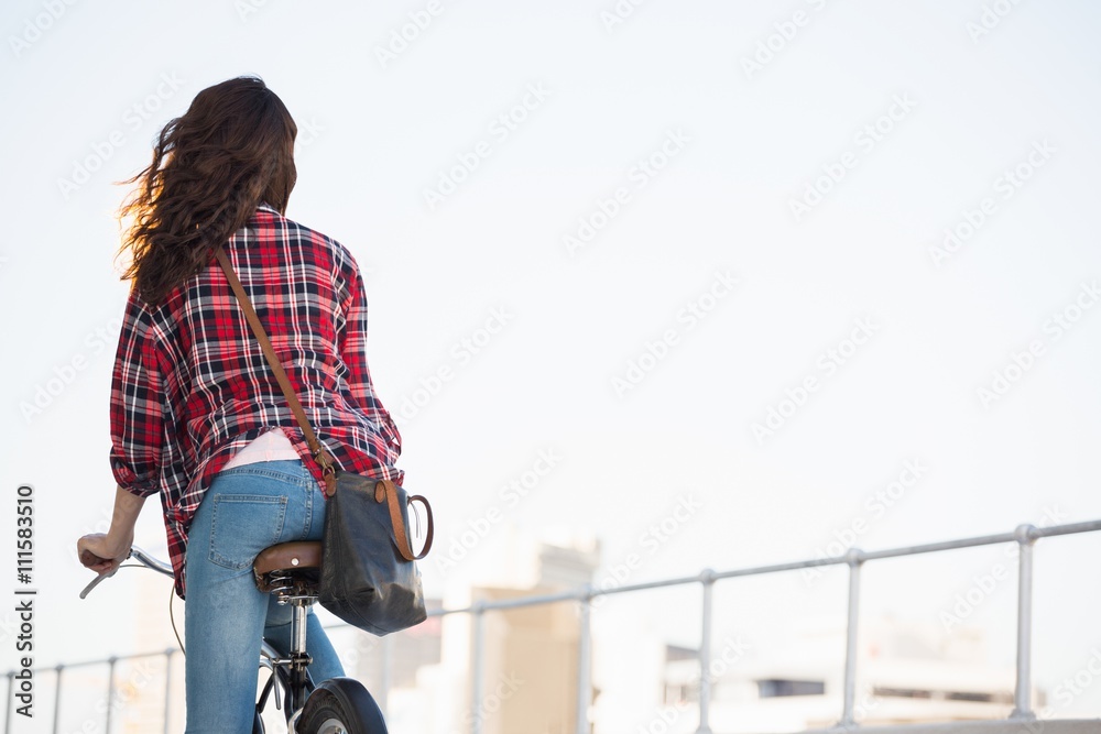 Hipster riding a bike