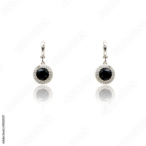 Pair of black spinel diamond earrings isolated on white 