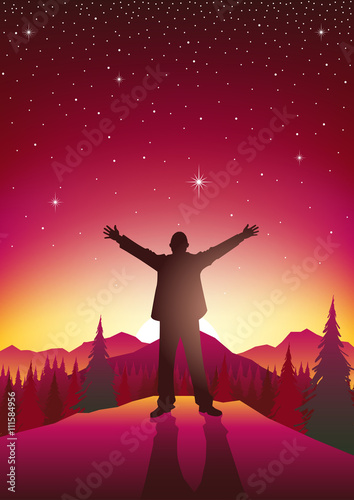 Man figure with open arms on top of hills