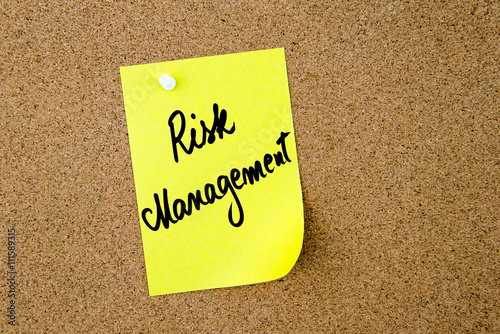 Risk Management written on yellow paper note