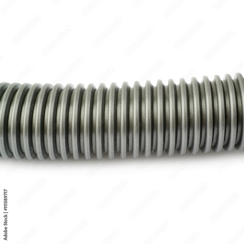 Part of Hand held small vacuum cleaner hose isolated over the white background Part of Hand held small vacuum cleaner hose isolated over the white background