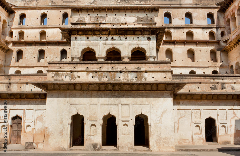 Facade of ancient structure of Jahangir Mahal fortress built in indo-islamic style