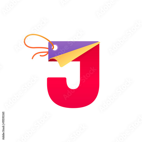 J letter with paper folded corner and sale tag.