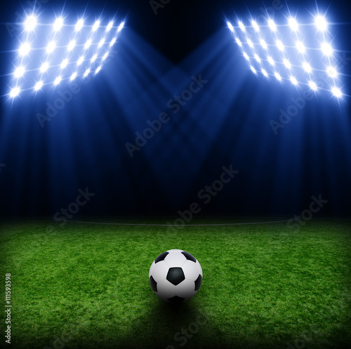 Soccer ball on green stadium