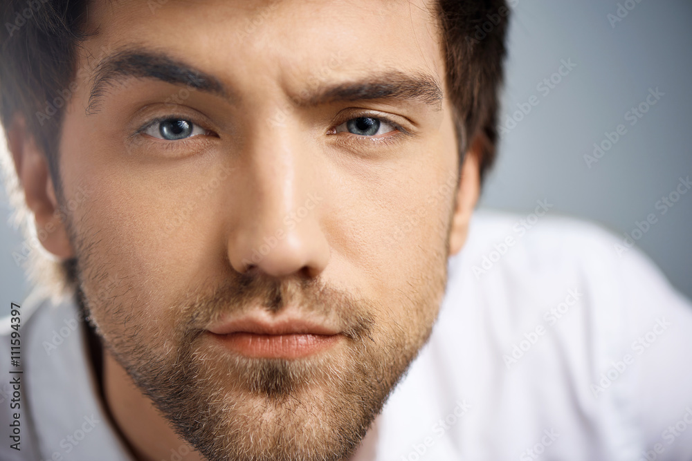 Close up portrait of serious elegant handsome young businessman Close up portrait of serious elegant handsome young businessman