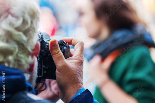 man taking photos