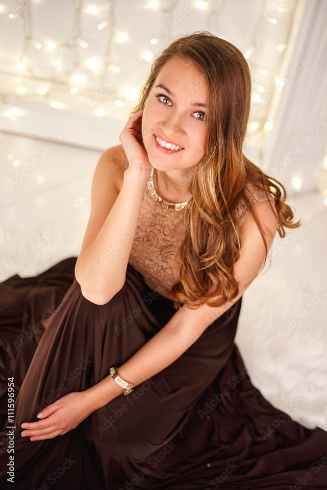 Close-up portrait of beautiful elegant young woman in gorgeous evening dress. Close-up portrait of beautiful elegant young woman in gorgeous evening dress.