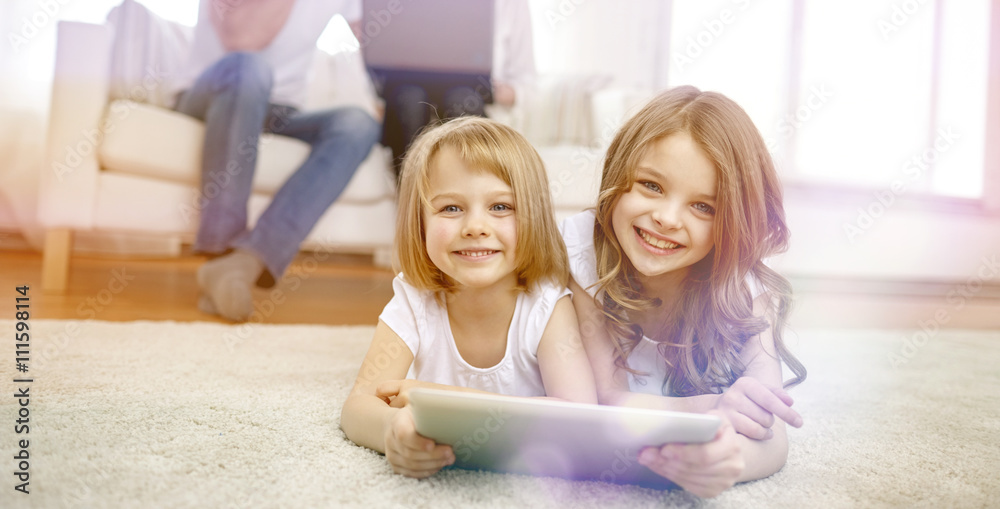 happy little girls with tablet pc computer at home happy little girls with tablet pc computer at home