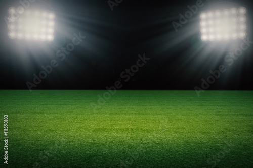 empty soccer field at night © phonlamaiphoto