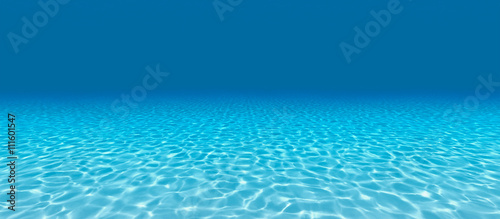 Sandy bottom, blue and surface underwater