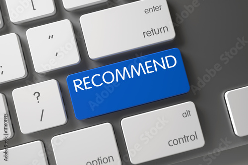 Modernized Keyboard Key Labeled Recommend. Concept of Recommend, with Recommend on Blue Enter Button on Slim Aluminum Keyboard. Recommend Written on Blue Key of Modernized Keyboard. 3D Render.