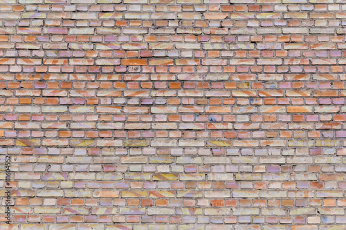 old cracked brickwork house wall