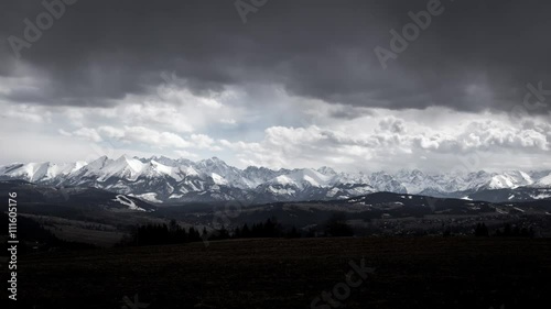 4K Timelapse of storm clouds over mountains
