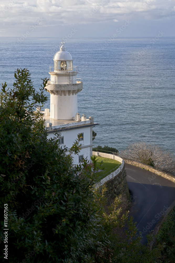 San Sebastian. Lighthouse on beside the road to Monte Igueldo. Faro del Monte Igueldo.
