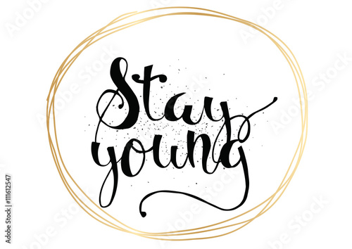 Stay young inscription. Greeting card with calligraphy. Hand drawn design. Black and white.