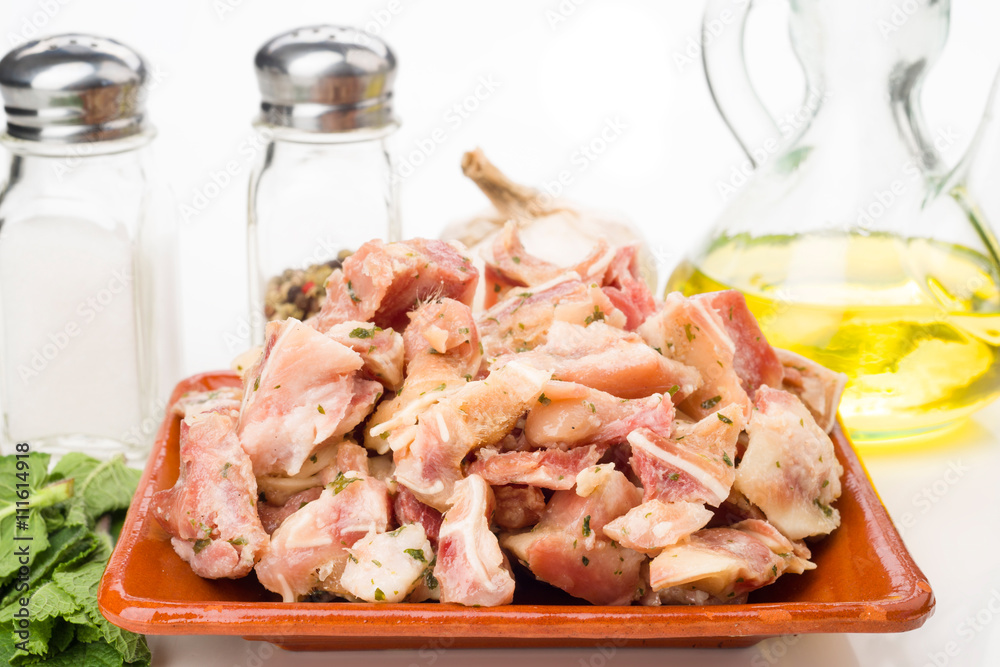 pig's ear cut into with condiments isolated on white pig's ear cut into with condiments isolated on white
