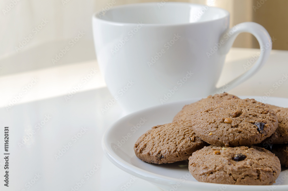 Chocolate chip cookies with cup of tea Chocolate chip cookies with cup of tea