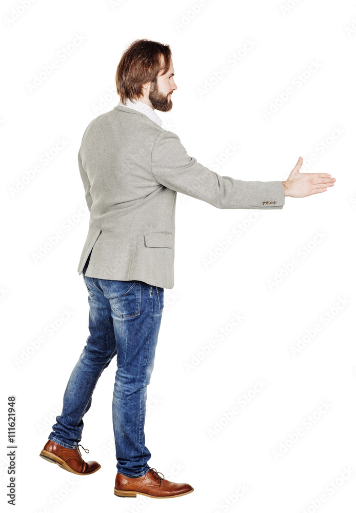 bearded businessman giving hand for an handshake.  human emotion