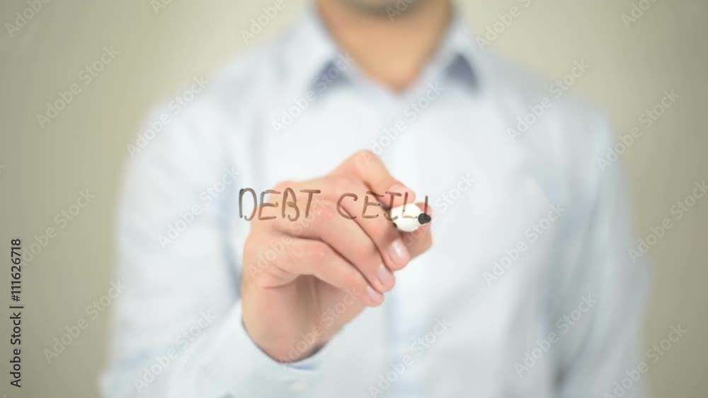 Debt Cieling , man writing on transparent screen Debt Cieling , man writing on transparent screen