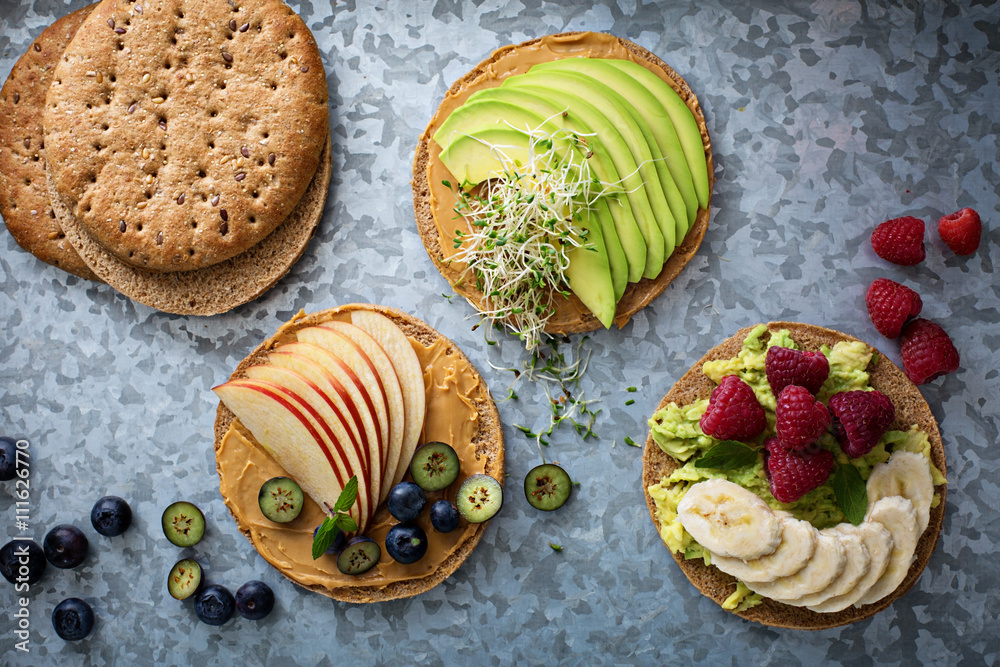 Wholegrain bread with variety of toppings Wholegrain bread with variety of toppings