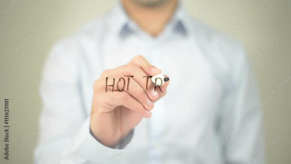 Hot Trip, man writing on transparent screen Hot Trip, man writing on transparent screen