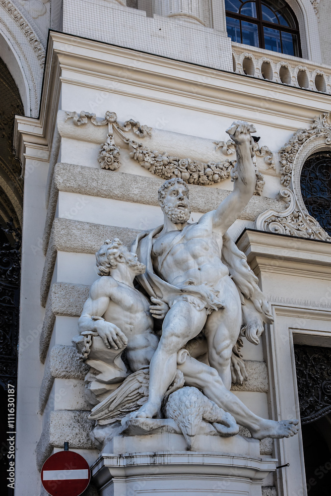 Hercules statue near entrance of Hofburg palace. Vienna, Austria
