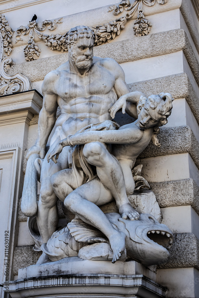 Obraz premium Hercules statue near entrance of Hofburg palace. Vienna, Austria