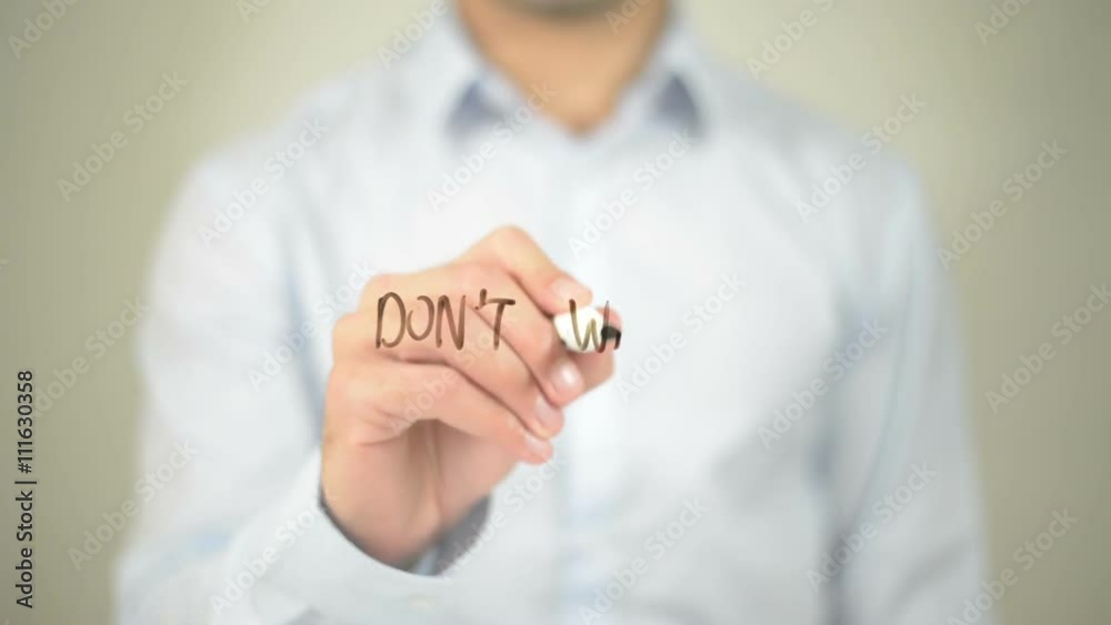 Don't Wait  , man writing on transparent screen