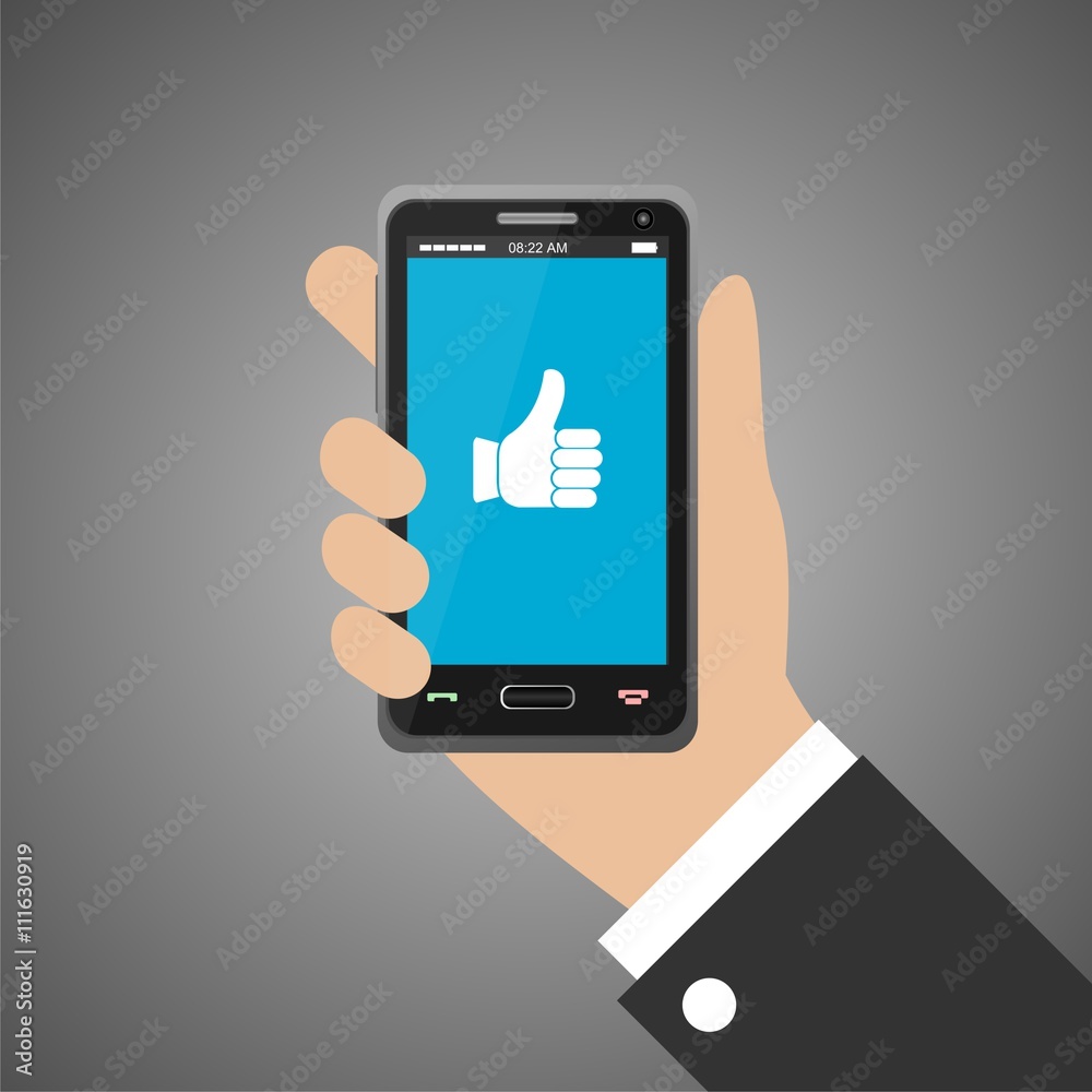 Hand holding smartphone with Like on display Hand holding smartphone with Like on display