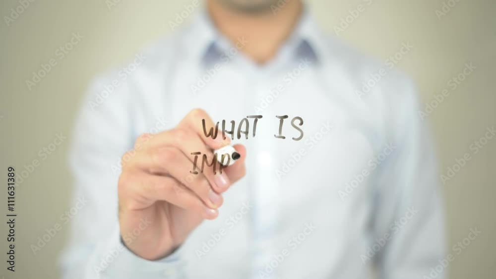 What is Important to You ? , man writing on transparent screen What is Important to You ? , man writing on transparent screen