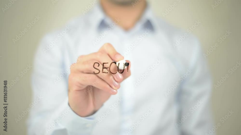 Secure, man writing on transparent screen Secure, man writing on transparent screen