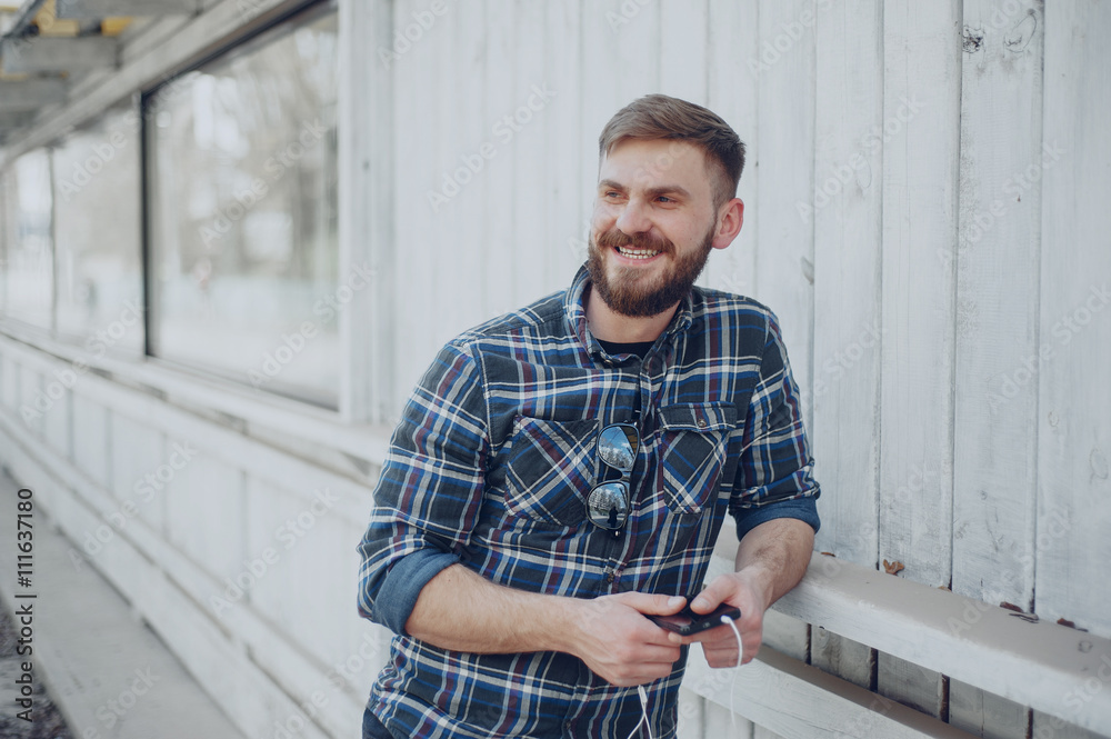 Fototapeta premium Man with gadget and glasses