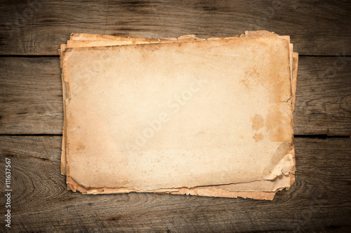 Stack old papers on old wood.