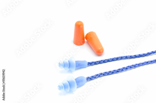 Canvas Print Blue and orange earplugs with a string on white background.