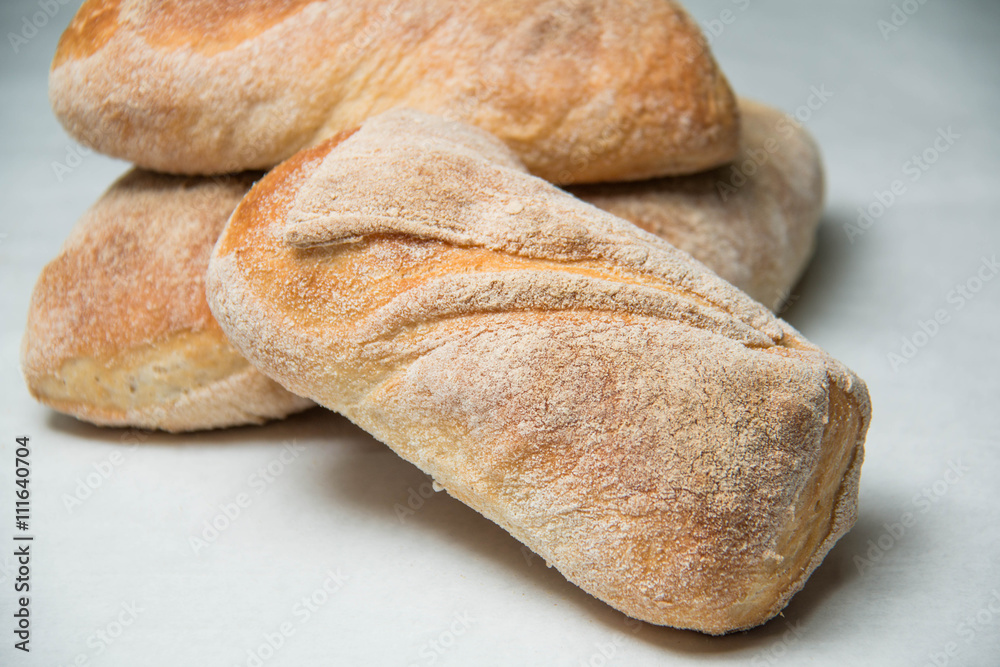  Ciabatta loaves of bread  background