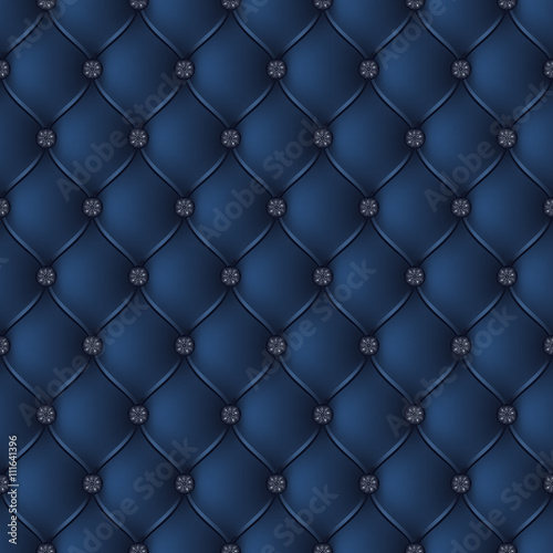 Abstract upholstery on a dark blue background.