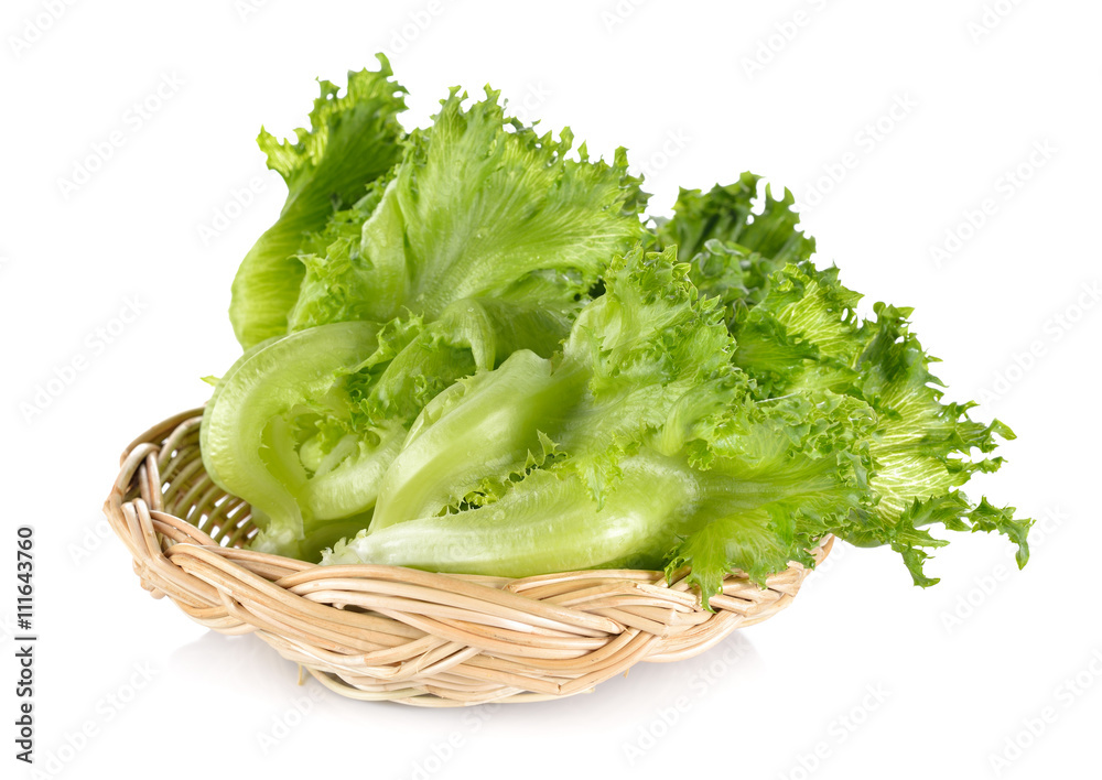 green frillies iceberg lettuce in rattan basket on white backgro green frillies iceberg lettuce in rattan basket on white backgro