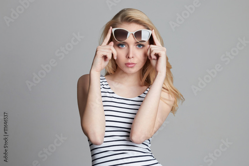 Beautiful young woman in sunglasses © photoagents
