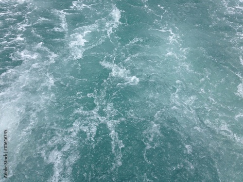 Wave foam due to ship propeller. © j_chaikom