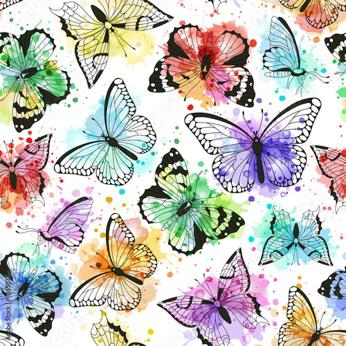 Seamless pattern with silhouettes of butterflies and vector imitation of watercolor spots.