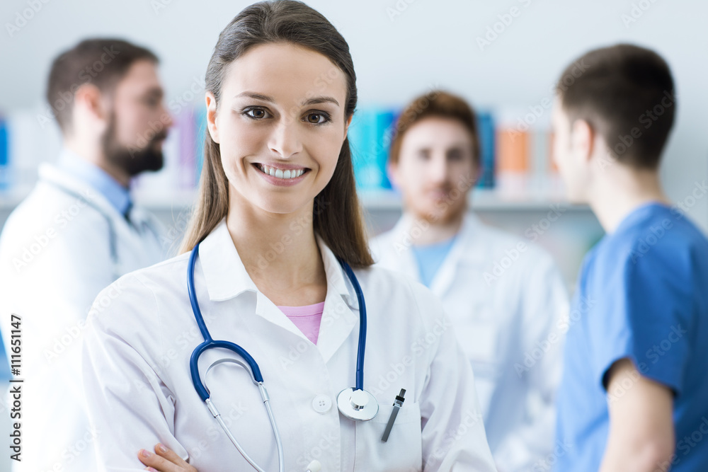 Female doctor smiling at camera Female doctor smiling at camera