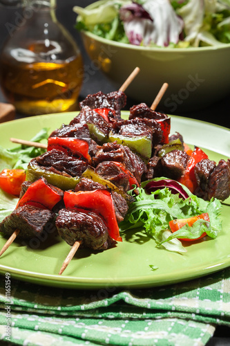 Grilled beef meat and vegetable kebabs