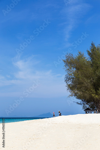 view of tropical beach and sea with blue sky at po da island, krabi Thailand