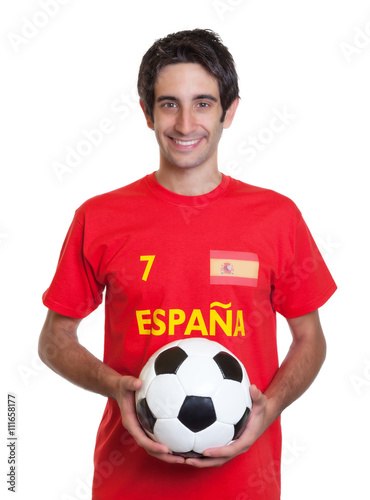 Happy spanish soccer fan with black hair and ball