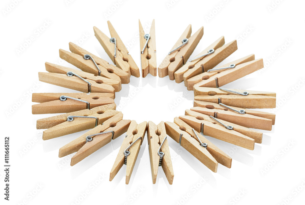 Wooden clothespins close-up isolated on white. Wooden clothespins close-up isolated on white.