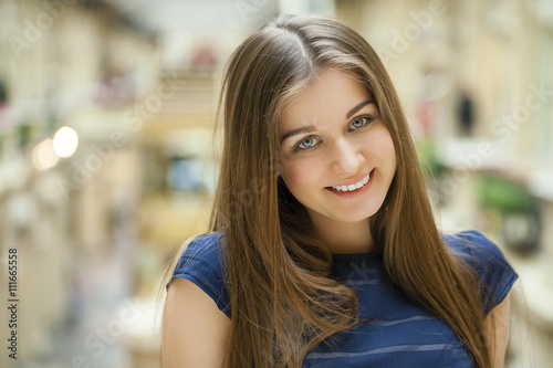 Portrait close up of young beautiful happy woman