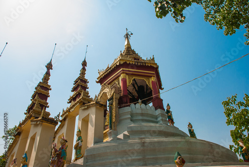 A fragment of the Golden decorative element. Bago. Myanma. Burma. photo