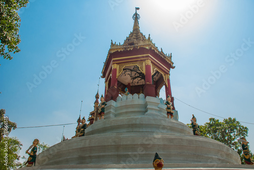 A fragment of the Golden decorative element. Bago. Myanma. Burma. photo