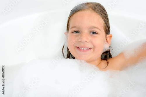 Toddler girl in bathtub
